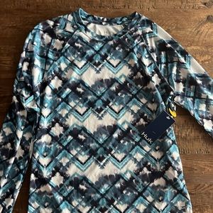 HUK Sun guard or wet suit top for women